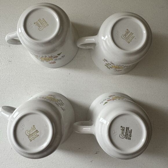 4 Corning Ware Corelle Spring Meadow White Coffee Tea Cups 8oz Yellow Pink - Picture 4 of 4
